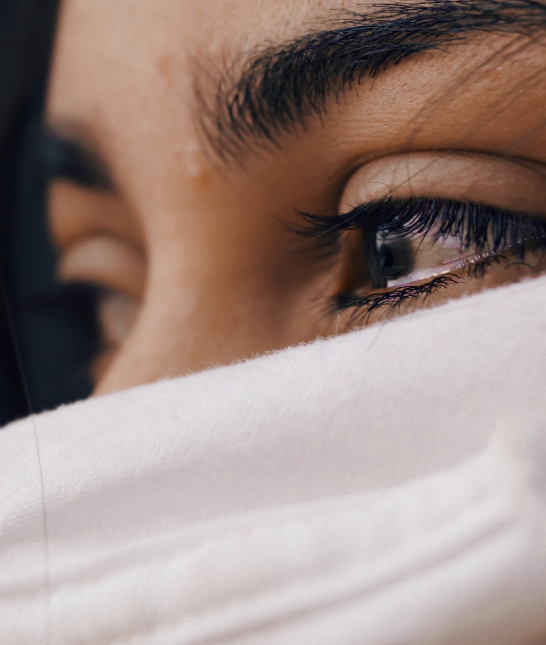 close-up of woman teary-eyed